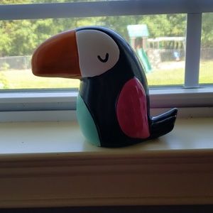 A glass multicolored toucan